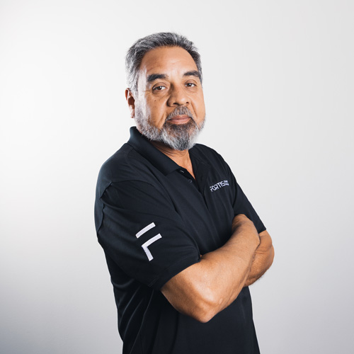 Hector Tiscareno, Superintendent, communicating with the Fortis Concrete Solutions crew.